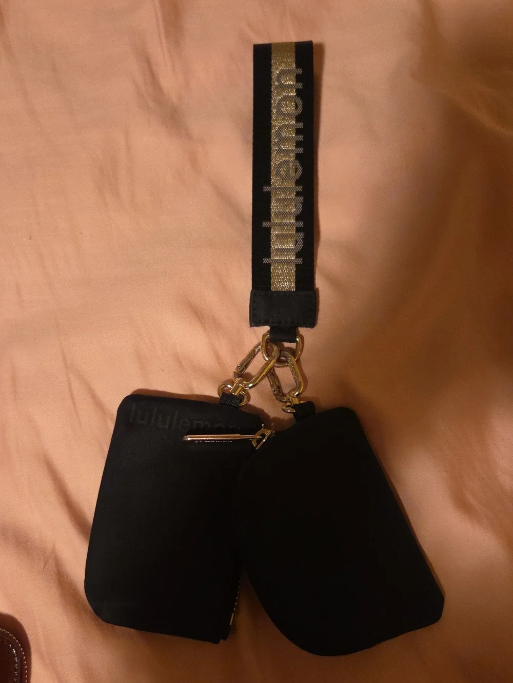 lululemon athletica Black Mini Wristlet Pouches with Gold Accent Strap